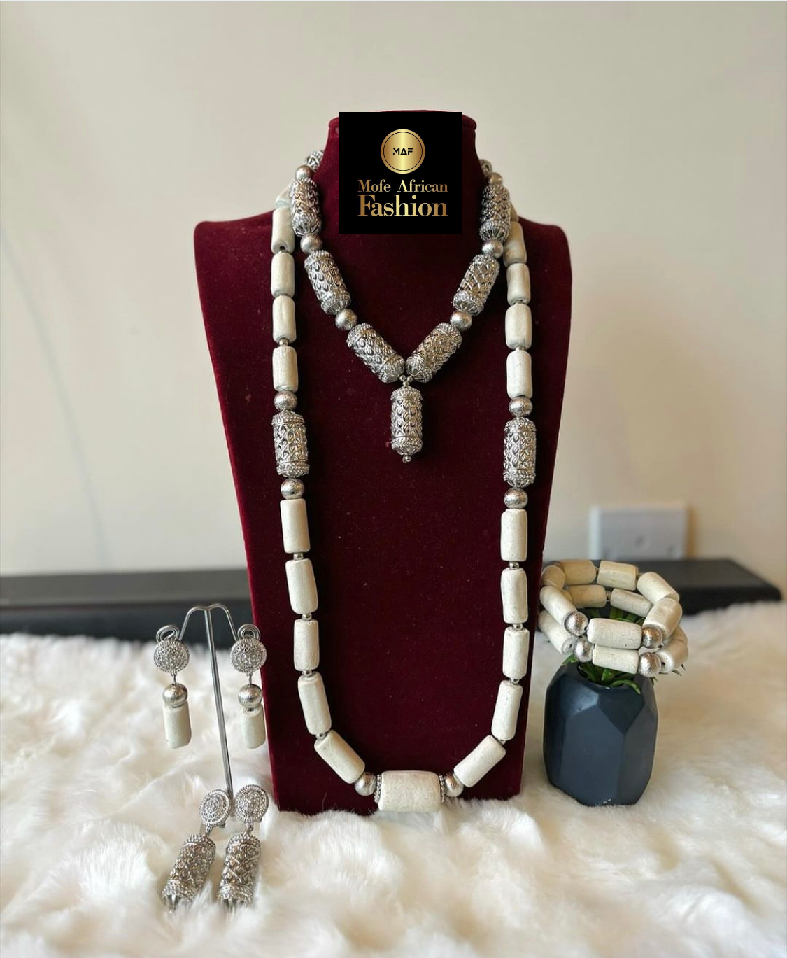 Tara Benin coral bead wedding jewelry set with gold and silver accessories for couples
